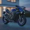 Modern motorcycle parked outside UK homes for a motorcycle trackers guide